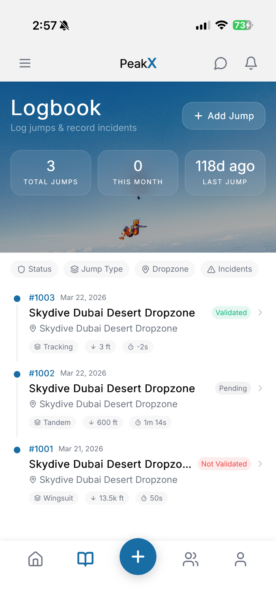 PeakX digital logbook showing jump history and stats